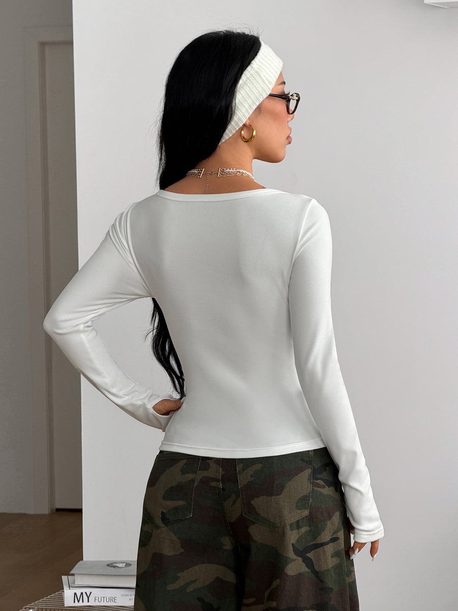 Women's slim fit long sleeve V-neck t-shirt with ruched bustier details in knitted stretch fabric