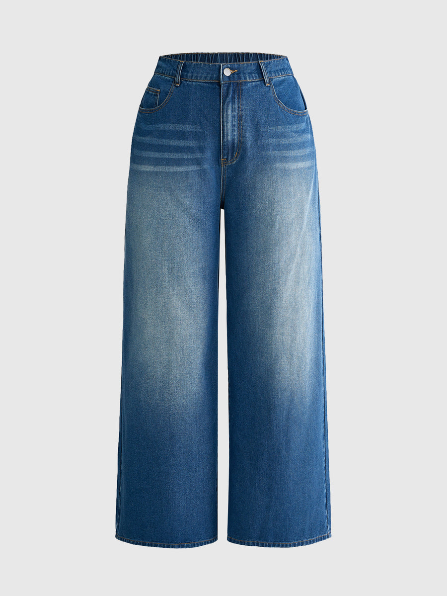 Women's gothic cross print baggy wide leg jeans made from denim with zipper fly and loose fit.