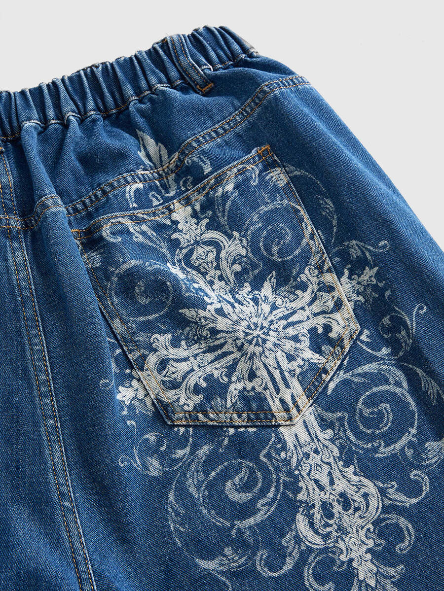 Women's gothic cross print baggy wide leg jeans made from denim with zipper fly and loose fit.