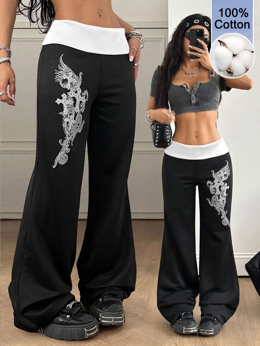 Women's black low waist wide leg flare sweatpants with rib-knit texture and contrast binding details.