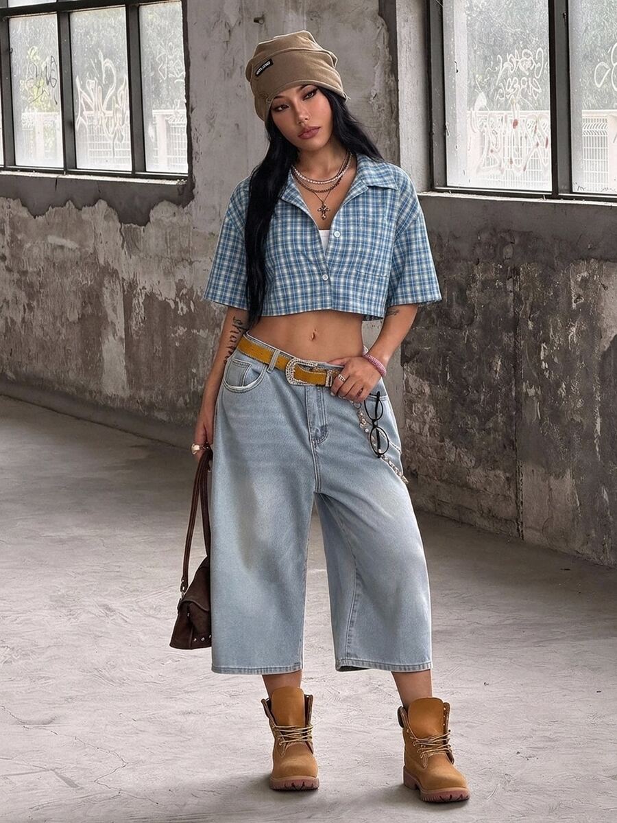 Women's plaid crop shirt with button front, chest pocket, short sleeves, and loose casual fit.