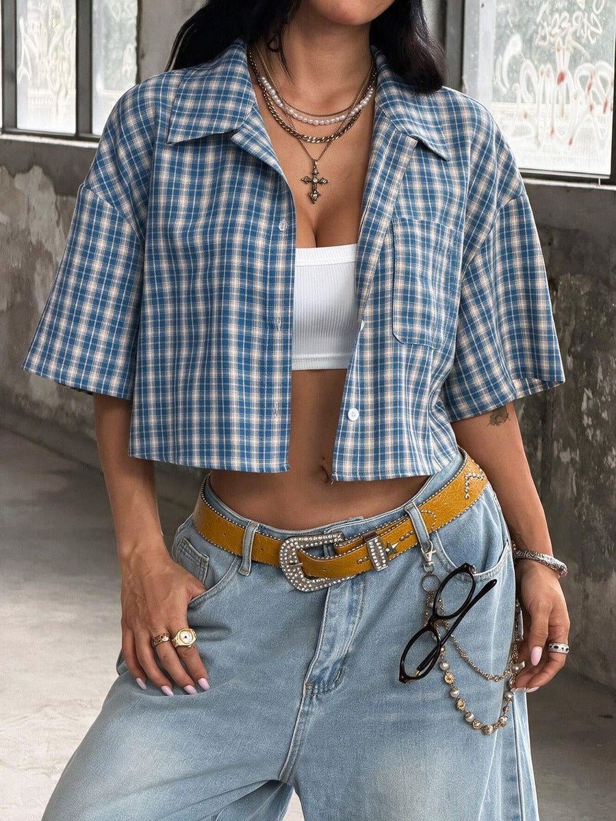 Women's plaid crop shirt with button front, chest pocket, short sleeves, and loose casual fit.