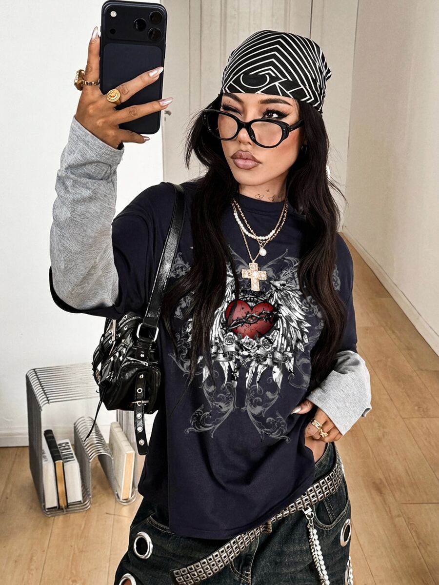 Women's casual 2-in-1 striped long sleeve graphic t-shirt featuring a round neckline, drop shoulders, rib-knit accents, and a loose fit.