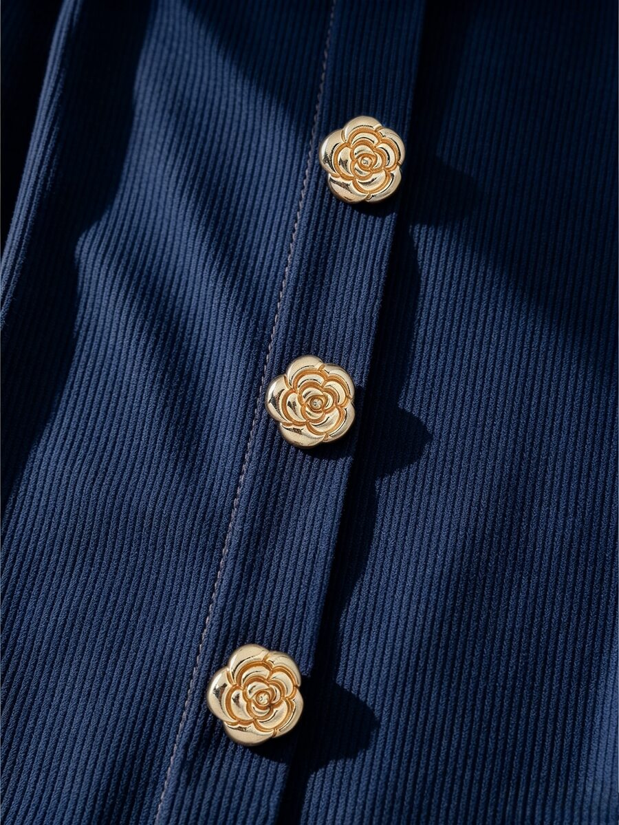 Women's slim fit square neck sleeveless knit tank top featuring a front faux placket with decorative gold metal buttons.