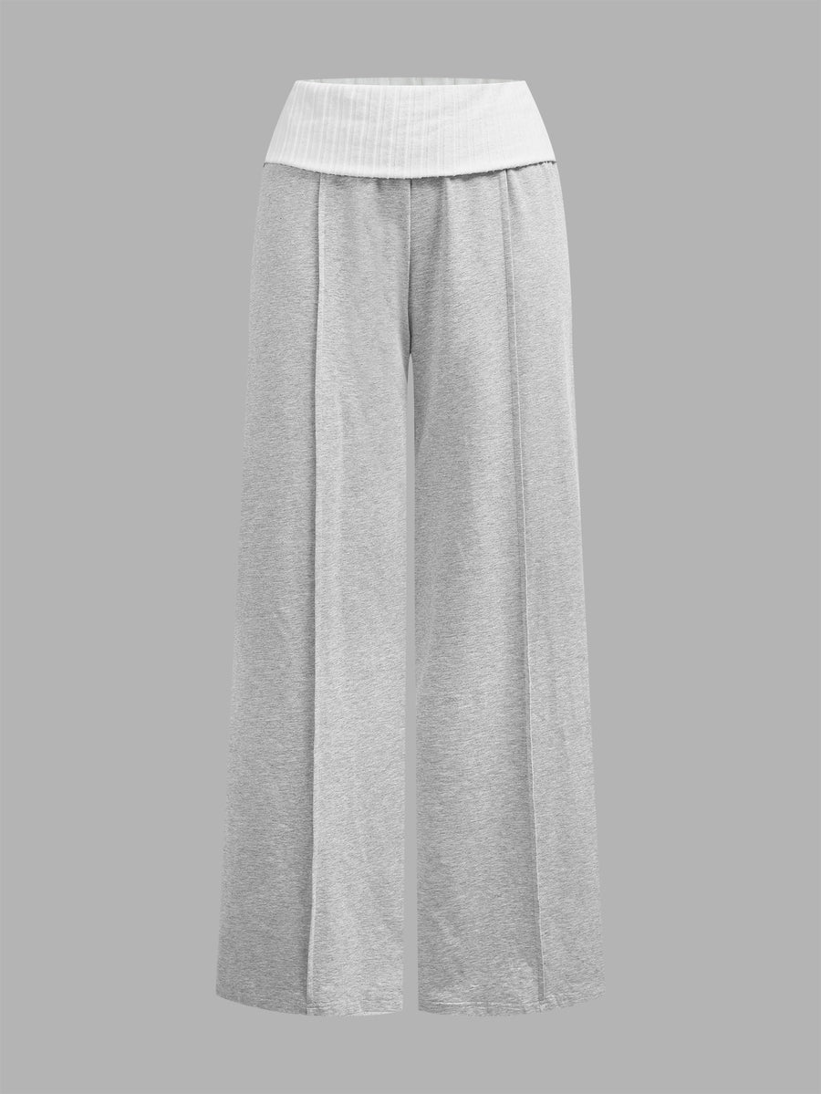 Women's wide leg flare lounge pants made of 95% cotton with a low elastic waistband and extra long hem.