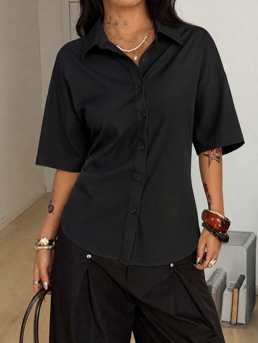 Women's casual button up shirt with half sleeves, classic shirt collar, and chest pocket in a woven fabric.