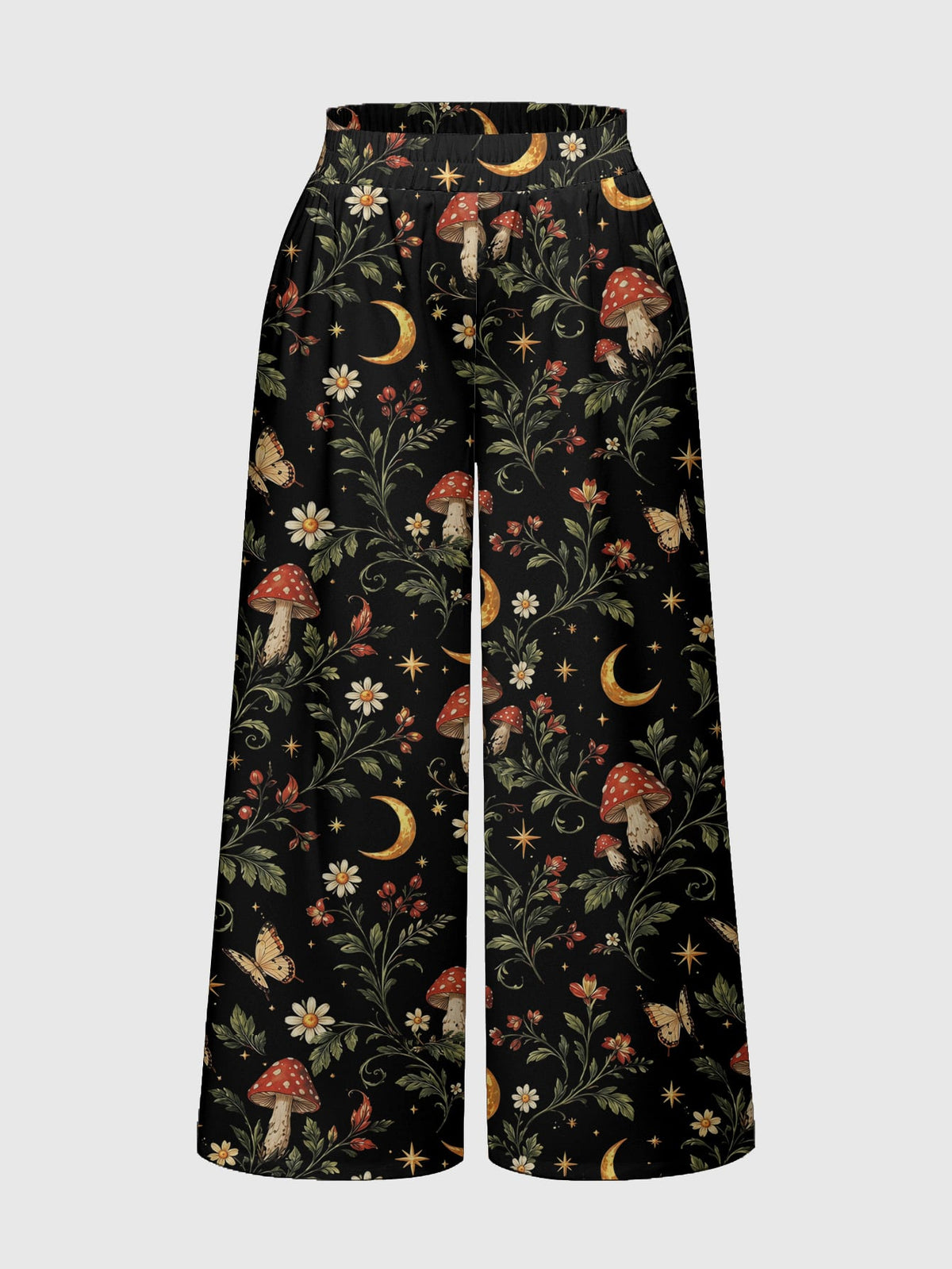 Women's plus size black gothic wide leg pants with split thigh detail and celestial moth, sun, and star pattern.