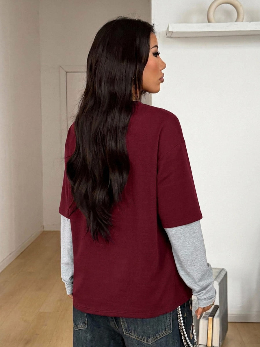 Women's casual 2-in-1 striped long sleeve graphic t-shirt featuring a round neckline, drop shoulders, rib-knit accents, and a loose fit.