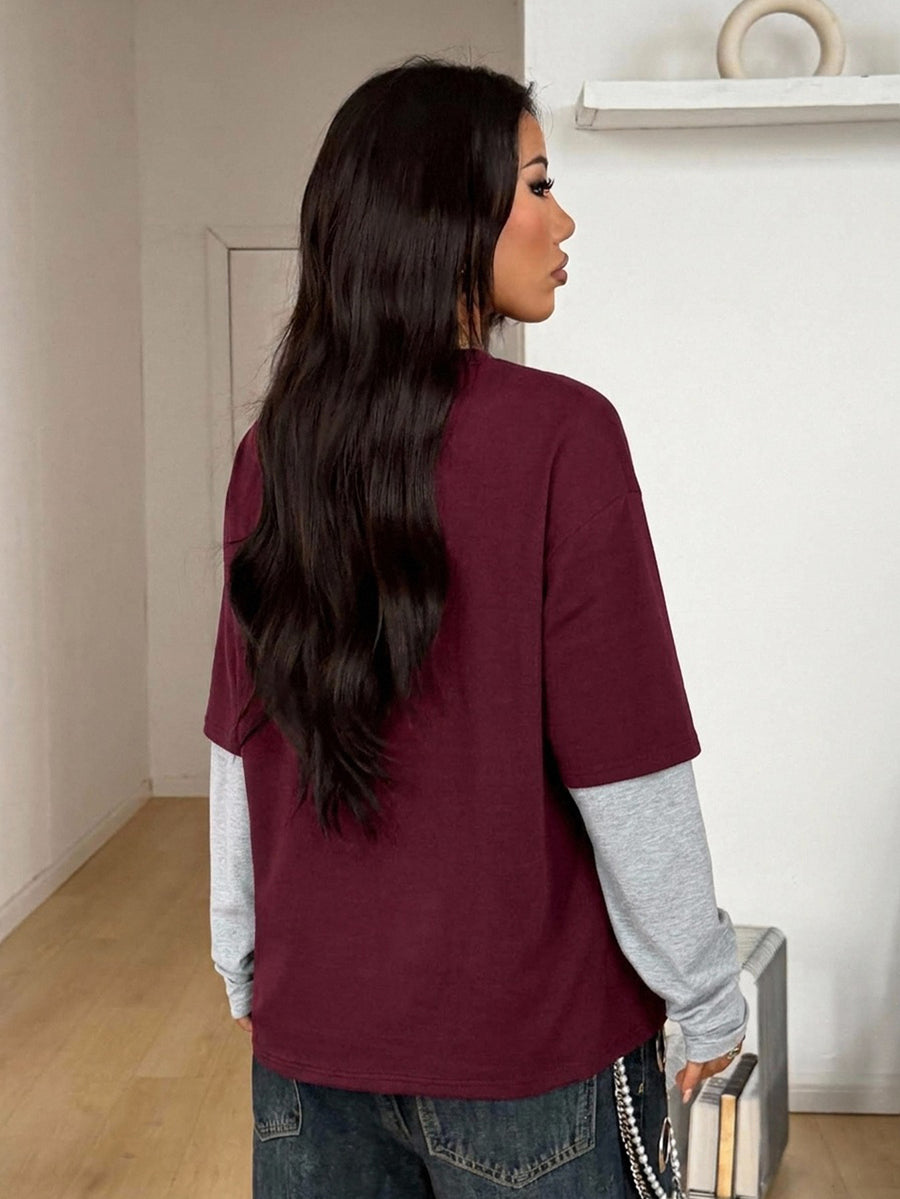 Women's casual 2-in-1 striped long sleeve graphic t-shirt featuring a round neckline, drop shoulders, rib-knit accents, and a loose fit.