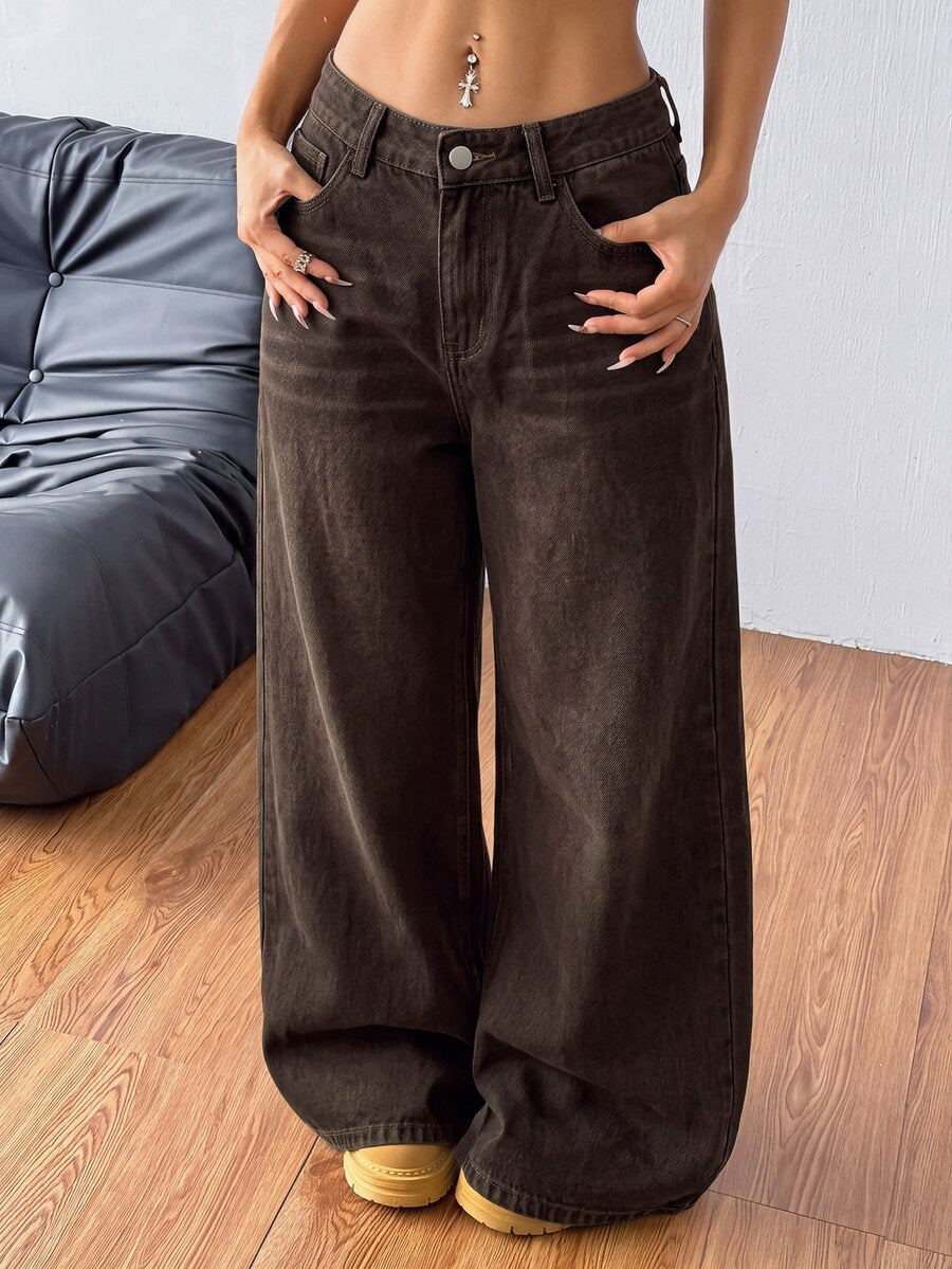Women's loose wide-leg jeans in light wash denim with low waist and extra-long relaxed fit
