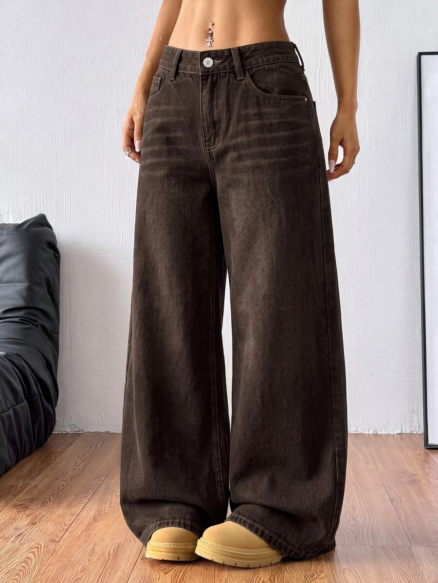 Women's loose wide-leg jeans in light wash denim with low waist and extra-long relaxed fit