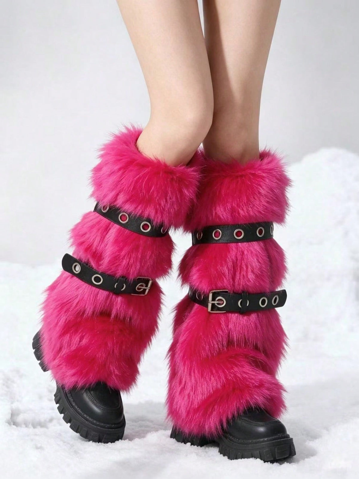 Pair of fuzzy leopard print leg warmers for women in a stylish winter goth aesthetic