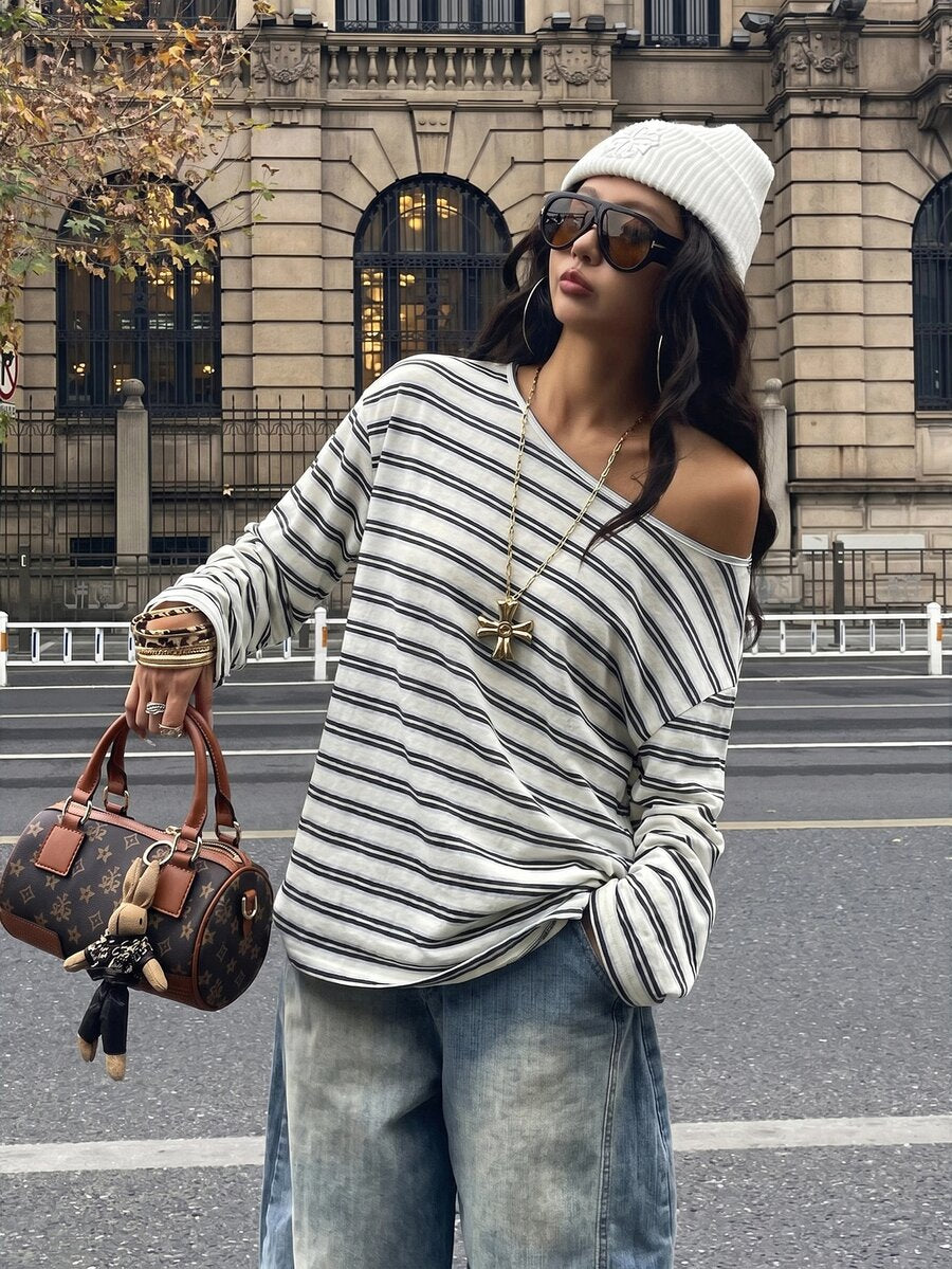 Women's brown striped boat neck long sleeve raglan T-shirt with a loose casual fit