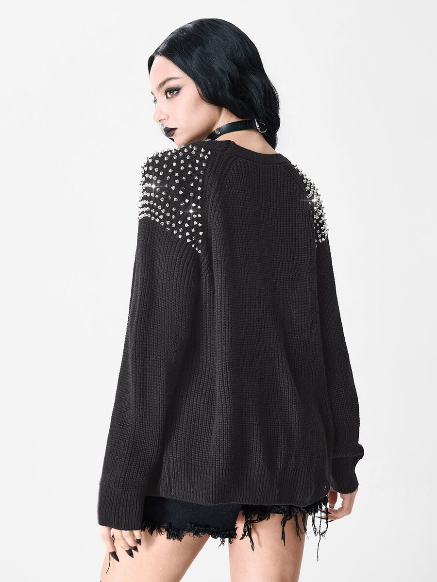 Women's loose knit V-neck cardigan sweater featuring long raglan sleeves, button-front closure, and front pockets.