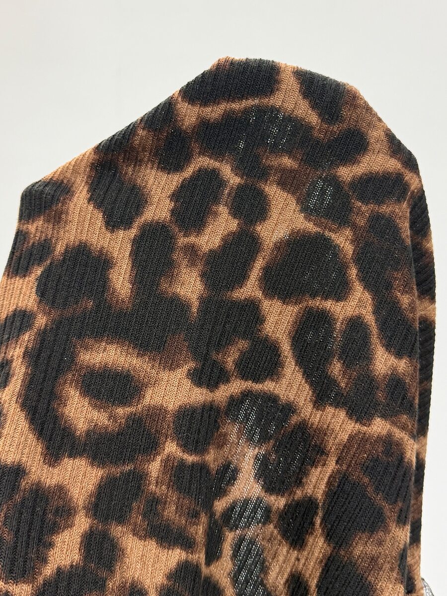 Women's slim fit off the shoulder long sleeve knitted top featuring contrast lace trim and ruched accents.