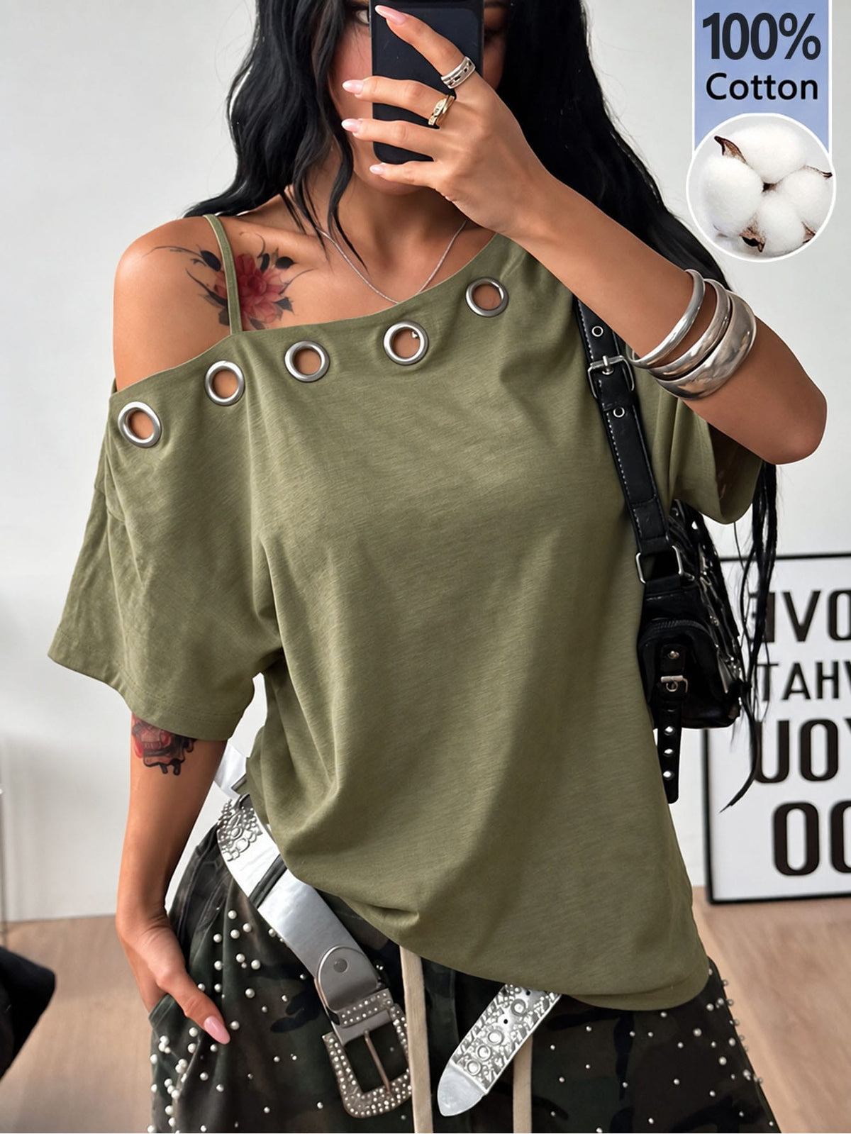 Women's casual loose fit cold shoulder cotton t-shirt with asymmetrical cutout neckline and short sleeves.