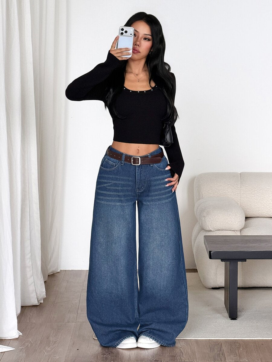Women's loose wide-leg jeans in light wash denim with low waist and extra-long relaxed fit