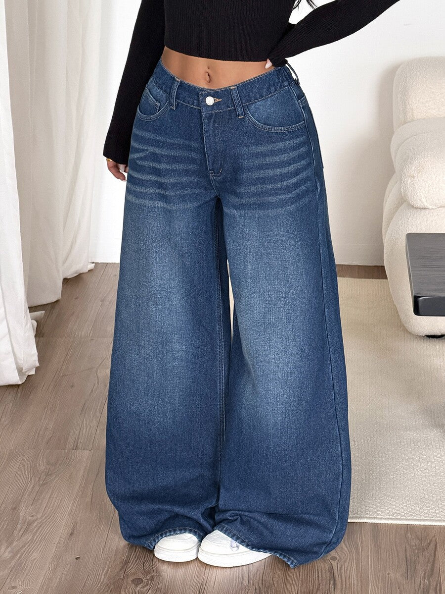Women's loose wide-leg jeans in light wash denim with low waist and extra-long relaxed fit