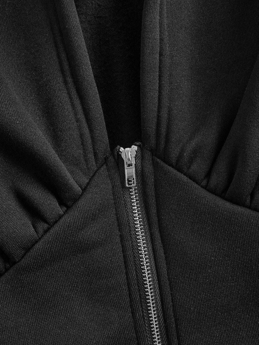 Women's black oversized zip-up hooded sweatshirt with drawstring hood and long sleeves.