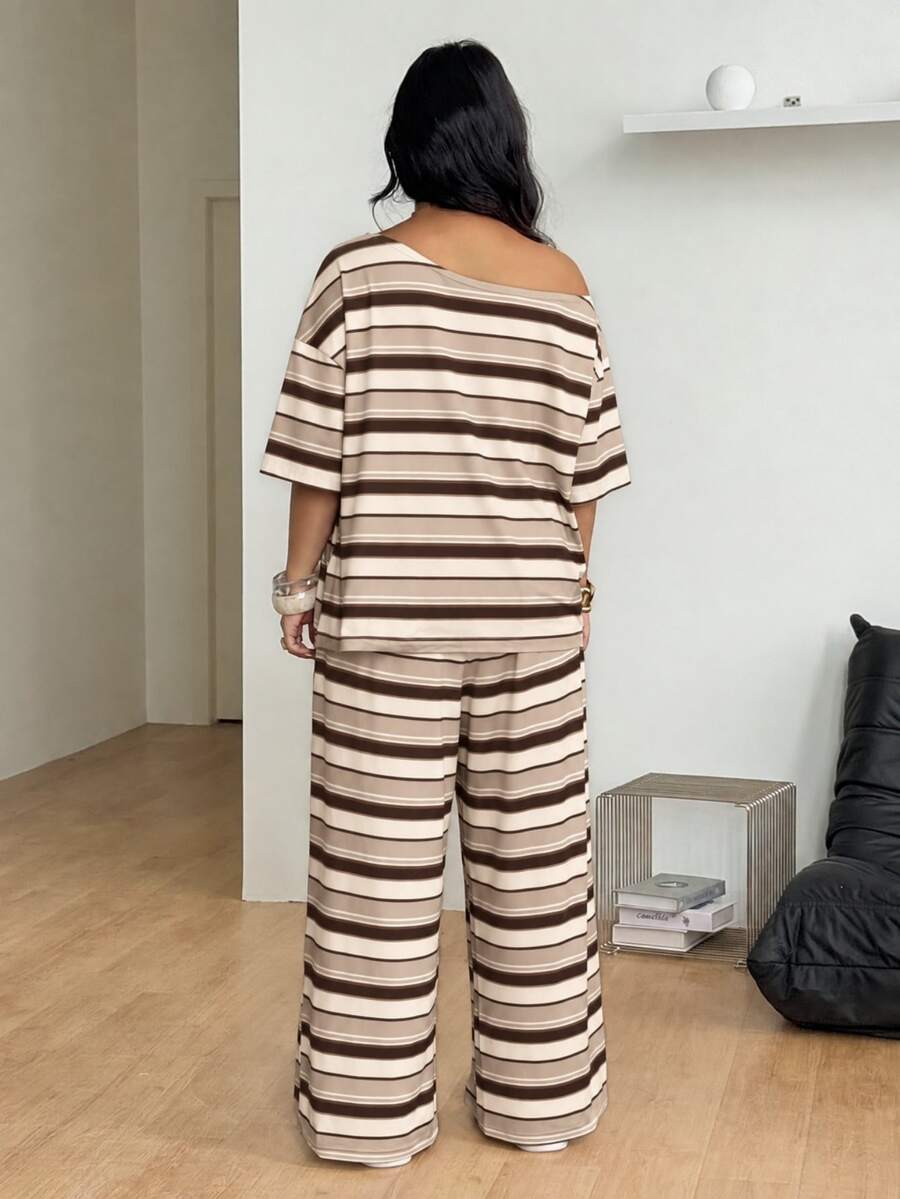 Striped two-piece casual outfit featuring an asymmetrical off-shoulder short-sleeve top and matching loose wide-leg pants with side pockets.