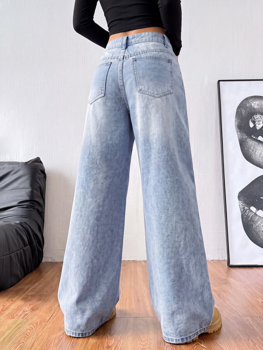 Women's loose wide-leg jeans in light wash denim with low waist and extra-long relaxed fit