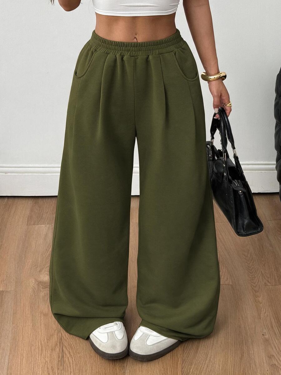 Women's loose wide leg casual sweatpants with an elastic waistband and side pockets