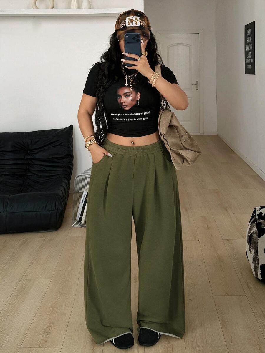 Women's loose wide leg casual sweatpants with an elastic waistband and side pockets