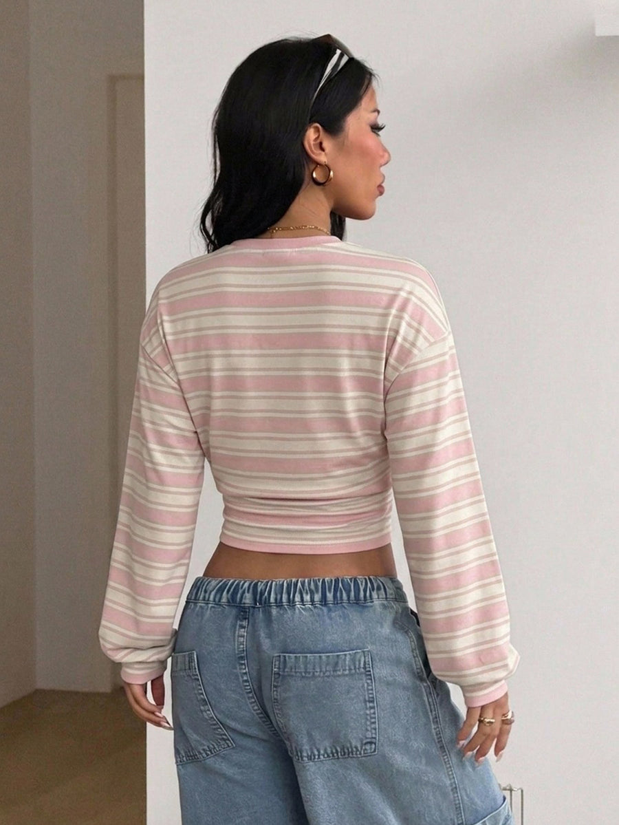 Women's brown waist-cinching sweatshirt featuring a round neck, drop shoulder long sleeves, and rib-knit cuffs.