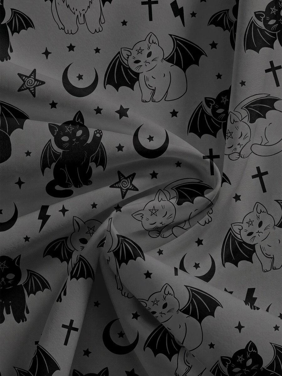 Women's plus size black gothic wide leg pants with split thigh detail and celestial moth, sun, and star pattern.