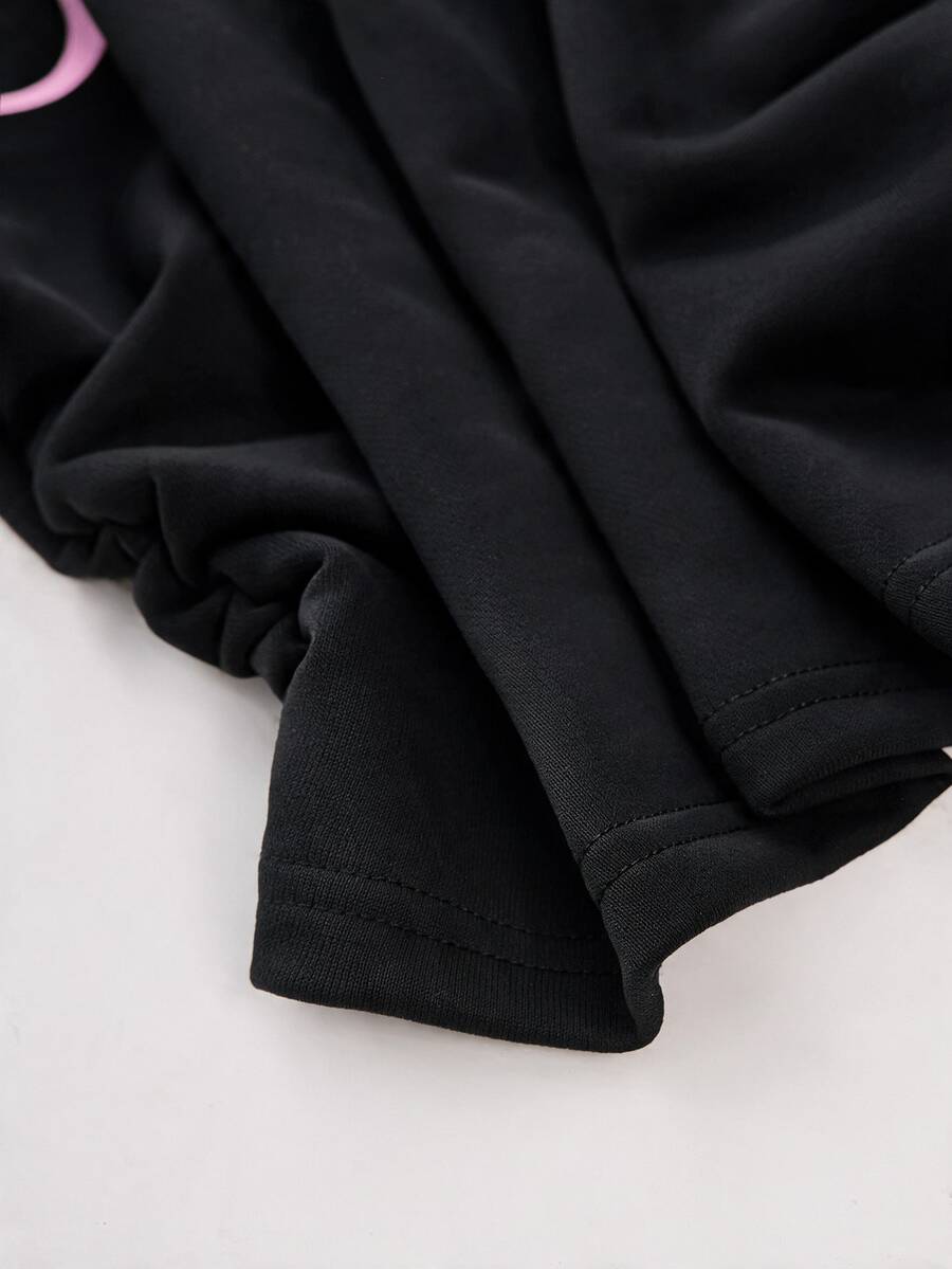Women's casual black long sleeve knitted pullover sweatshirt featuring a round neck and cinched waist design.
