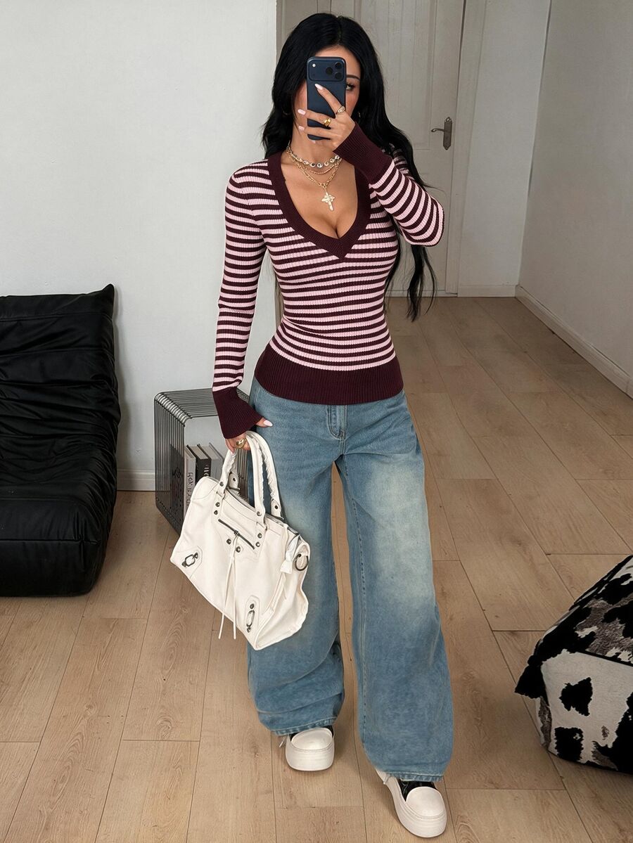 Women's slim fit cable-knit pullover sweater with deep V-neck and ribbed long sleeves