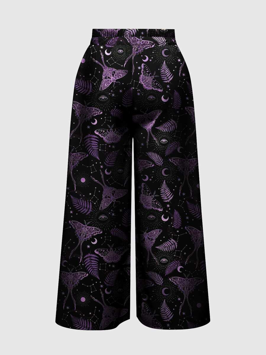 Women's plus size black gothic wide leg pants with split thigh detail and celestial moth, sun, and star pattern.