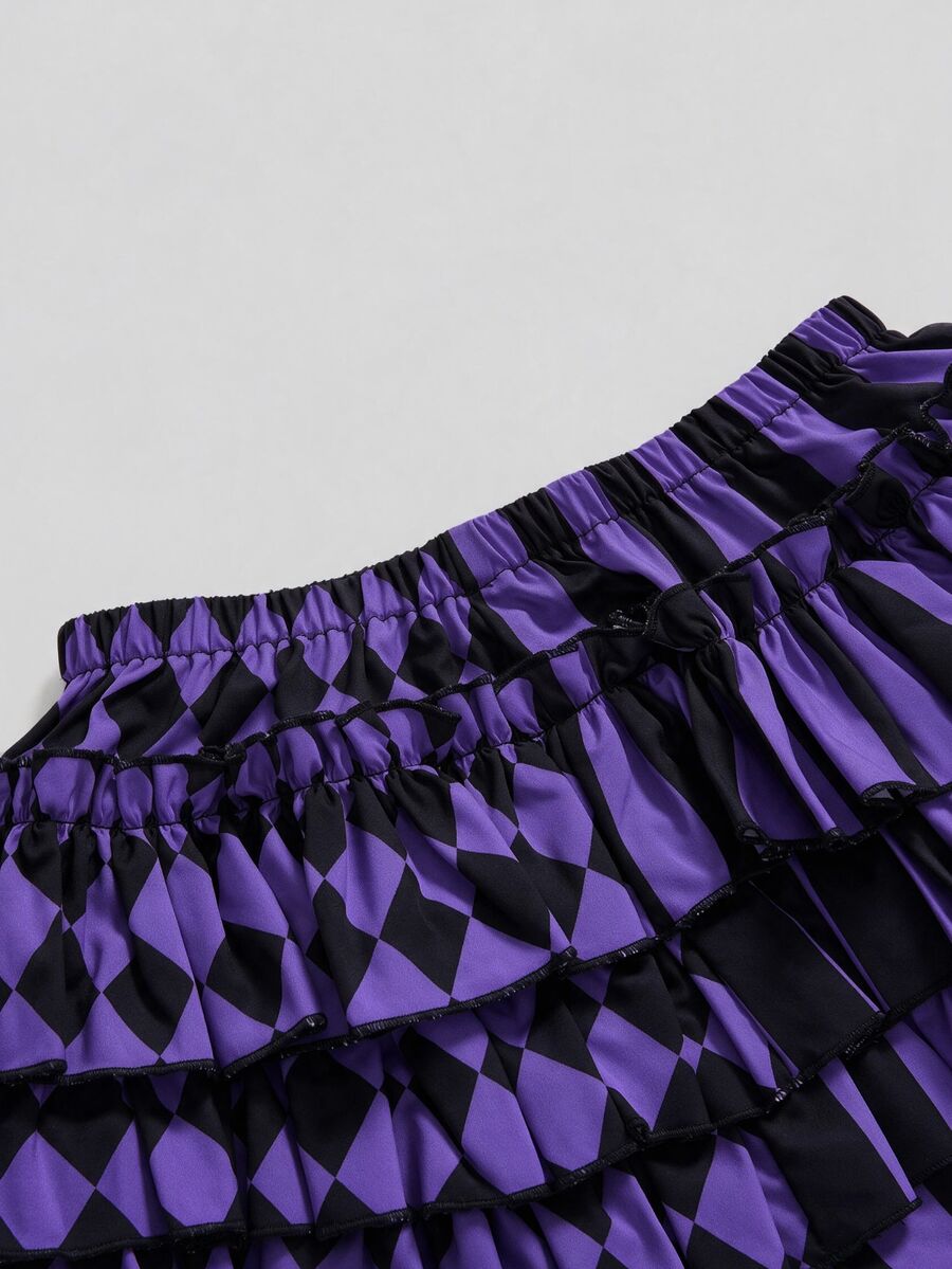 Women's gothic patchwork pumpkin shorts with tiered ruffle hem and geometric striped plaid pattern.