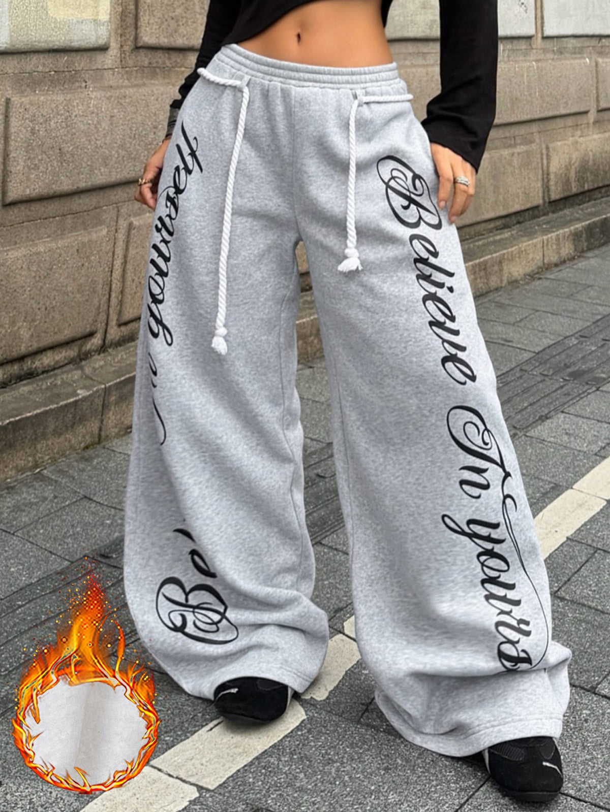 Women's wide leg trousers with a tree branch graphic pattern, loose fit, and mid-rise waist in woven fabric.