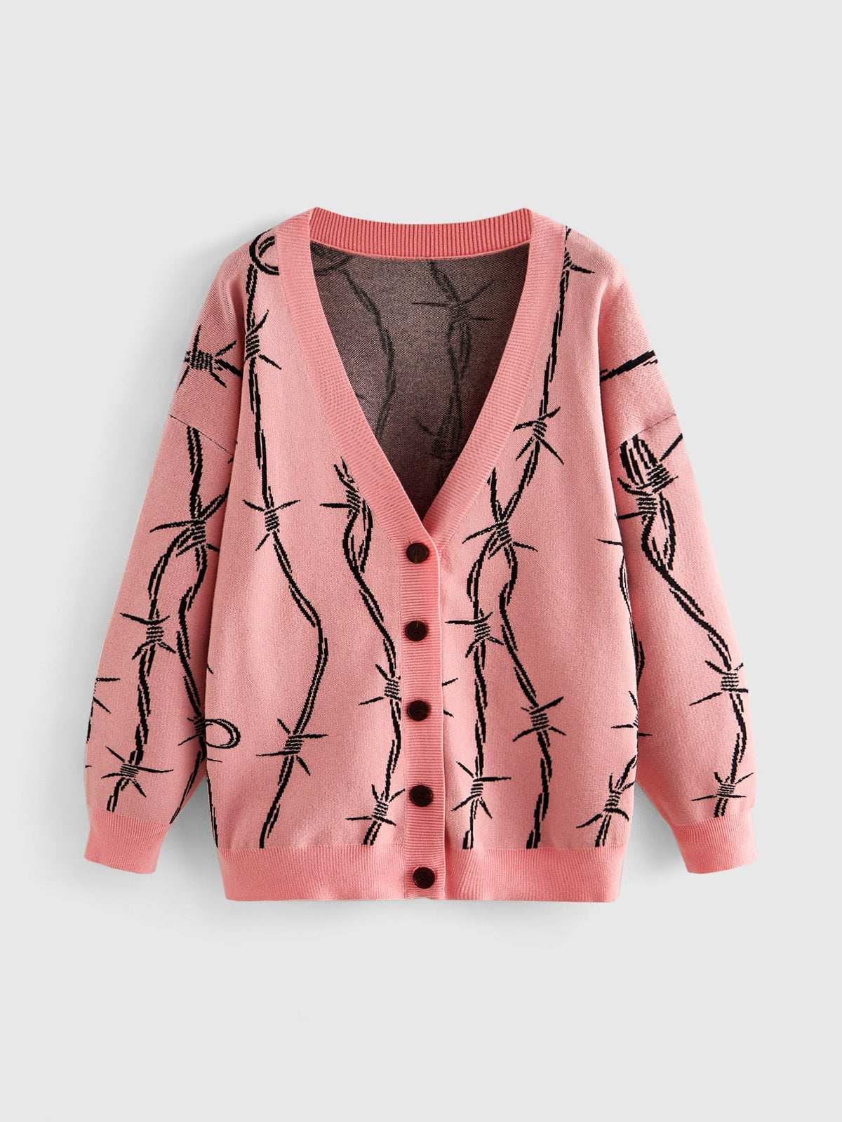 Women's oversized gothic thorn jacquard knit cardigan with V-neckline, button-front closure, and long drop-shoulder sleeves.