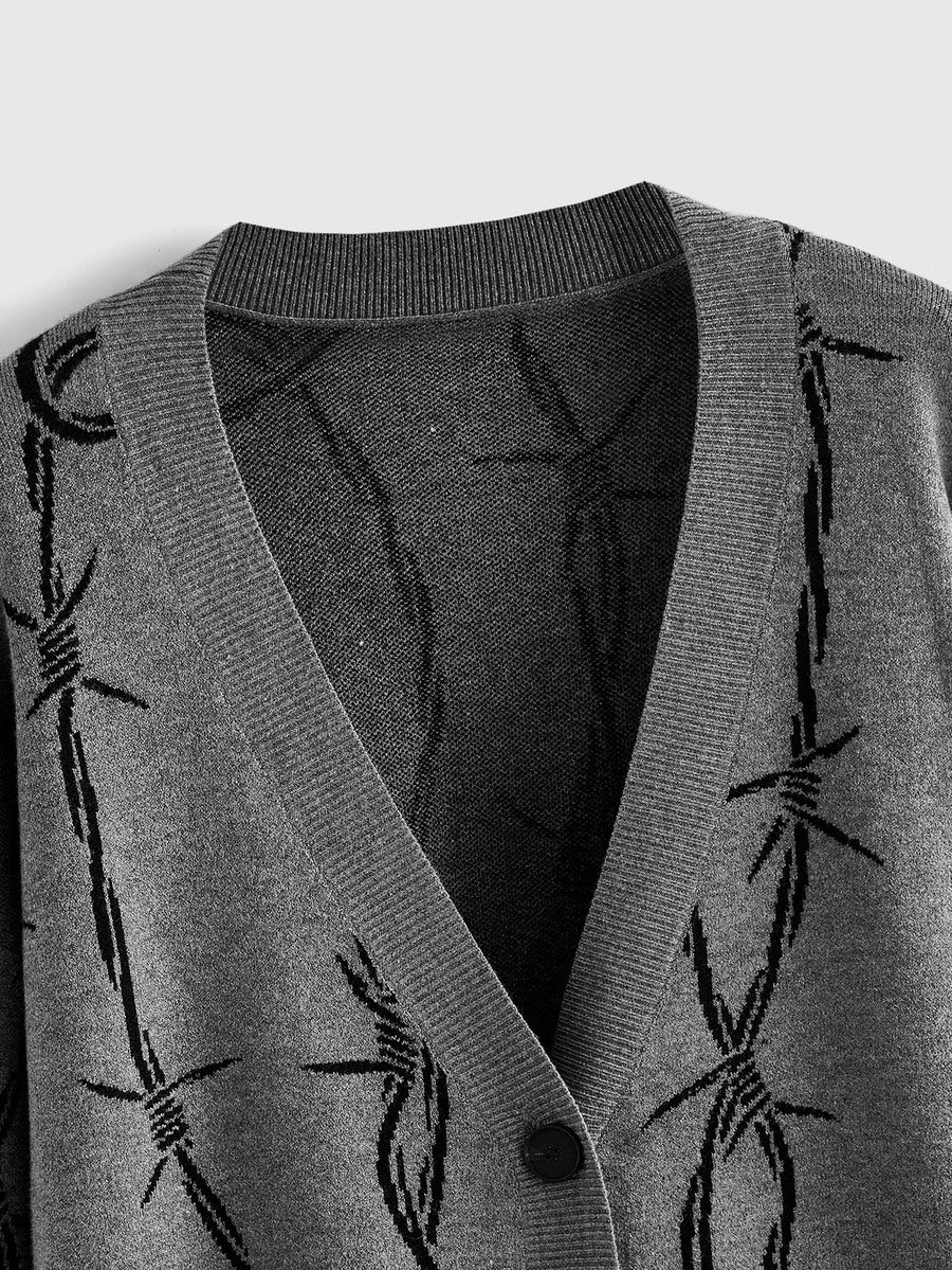 Women's oversized gothic thorn jacquard knit cardigan with V-neckline, button-front closure, and long drop-shoulder sleeves.