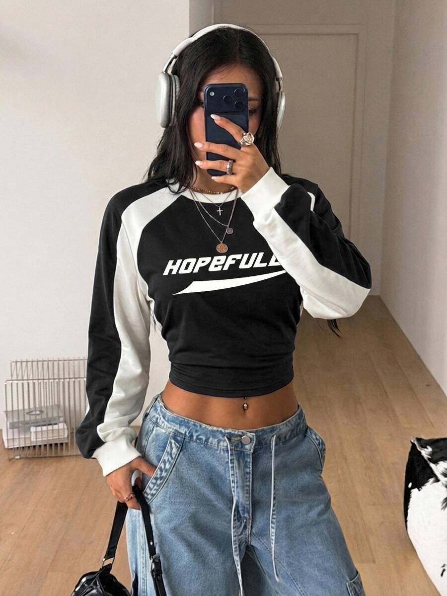 Women's brown waist-cinching sweatshirt featuring a round neck, drop shoulder long sleeves, and rib-knit cuffs.