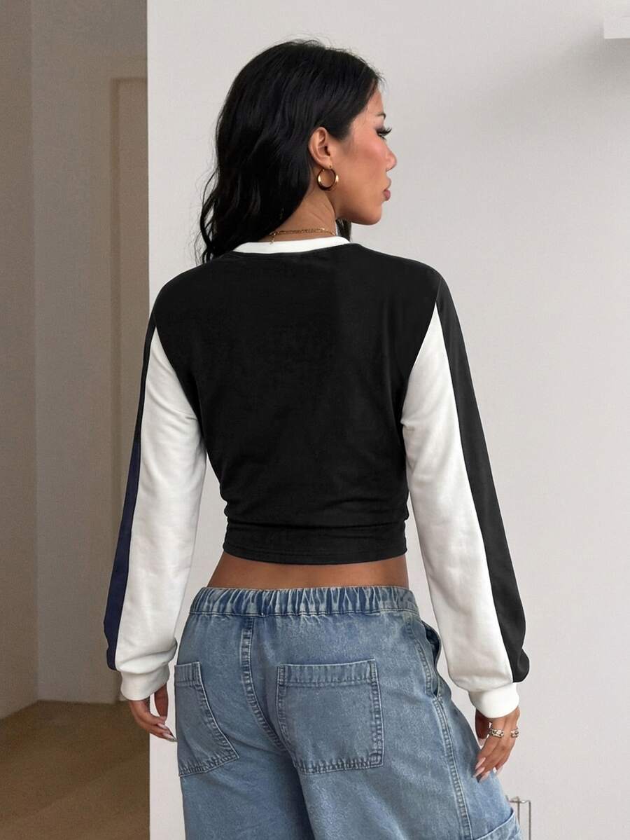 Women's brown waist-cinching sweatshirt featuring a round neck, drop shoulder long sleeves, and rib-knit cuffs.