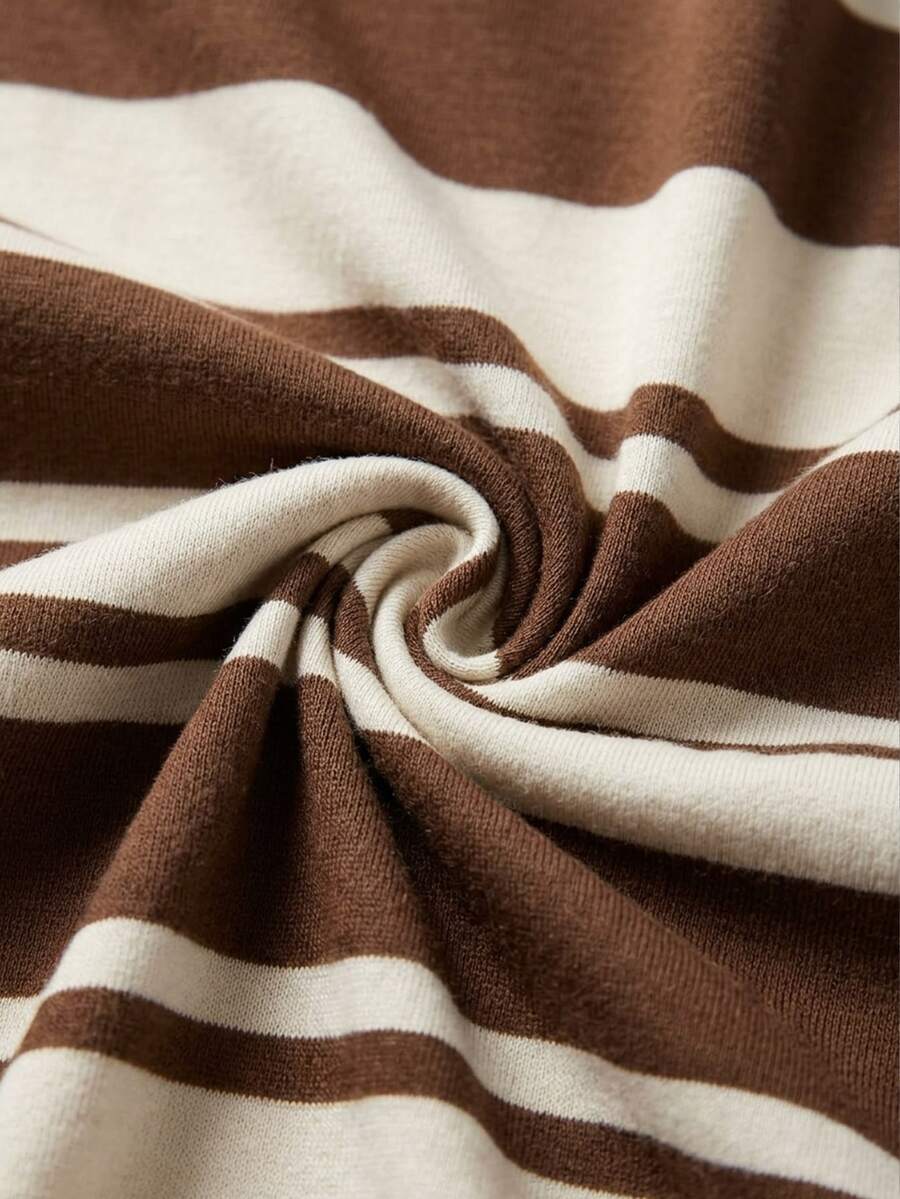 Women's striped pullover sweatshirt featuring drop shoulder long sleeves and a classic round neckline.