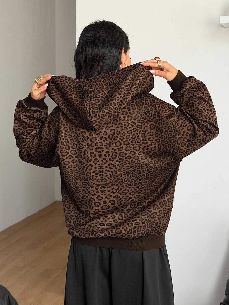 Women's brown leopard print zip-up hoodie with contrast faux fur trim and long bishop sleeves