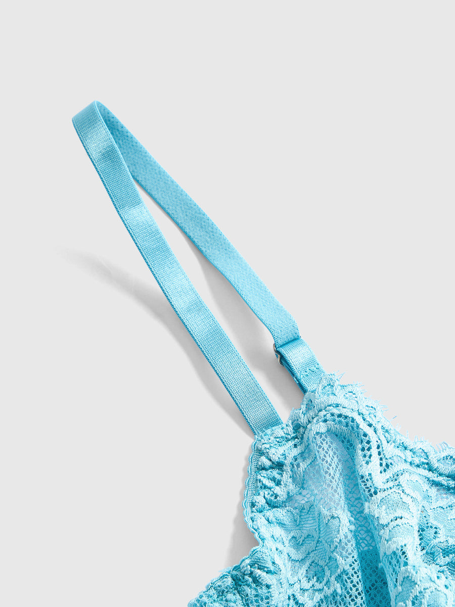 Sheer floral lace underwire triangle bra for women featuring adjustable straps and plunge cup design.
