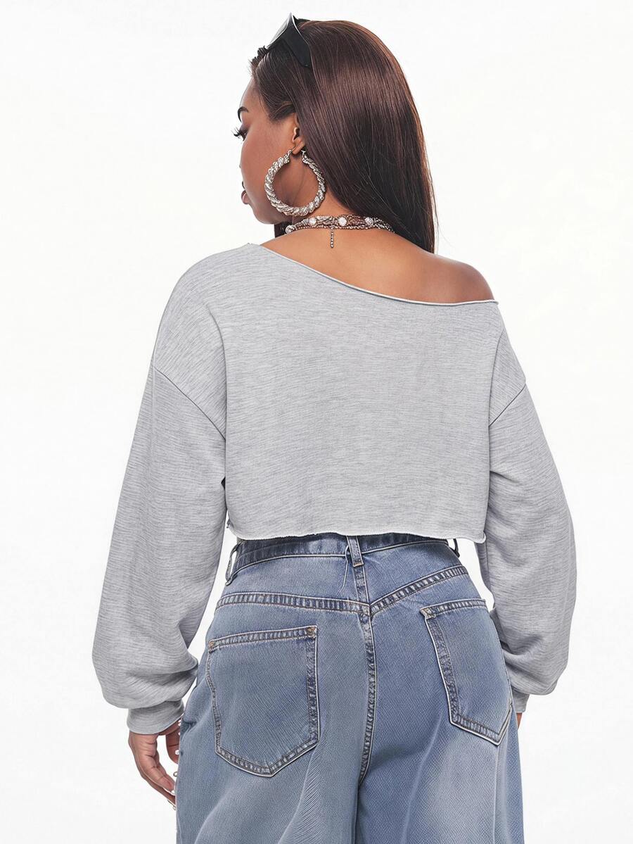 Women's plain oversized boat neck sweatshirt with long raglan sleeves in a relaxed pullover fit.