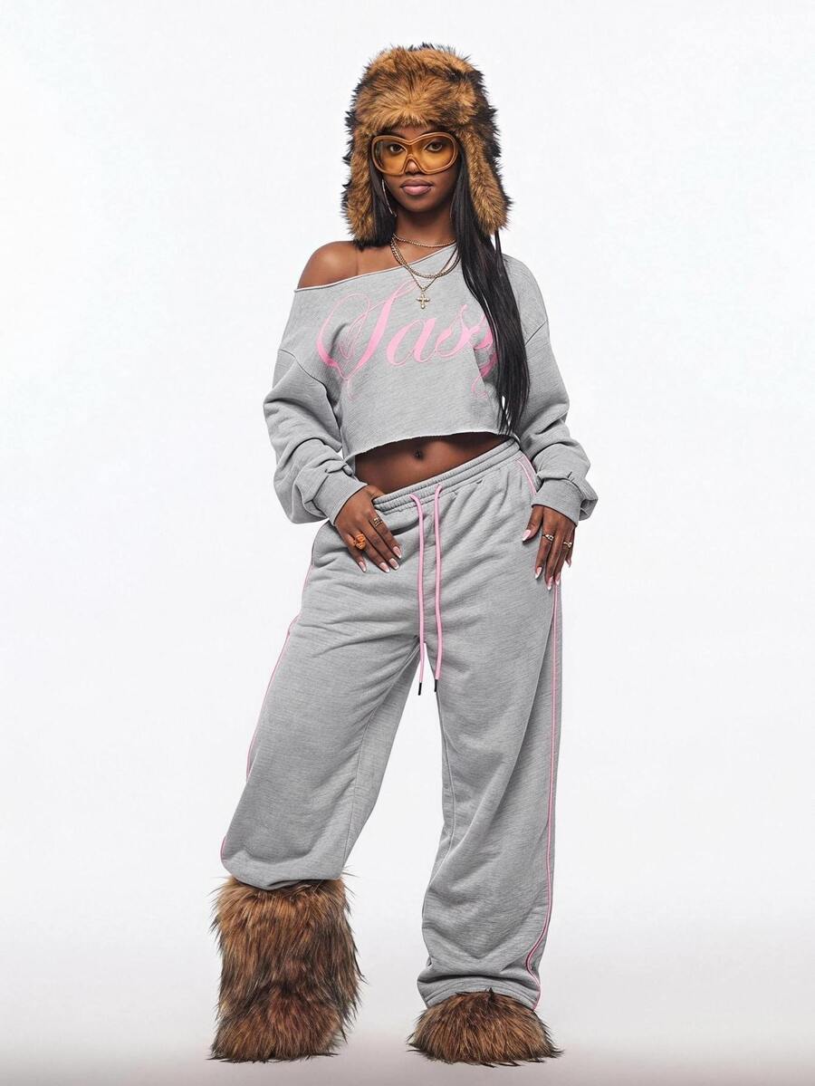 Women's plain oversized boat neck sweatshirt with long raglan sleeves in a relaxed pullover fit.