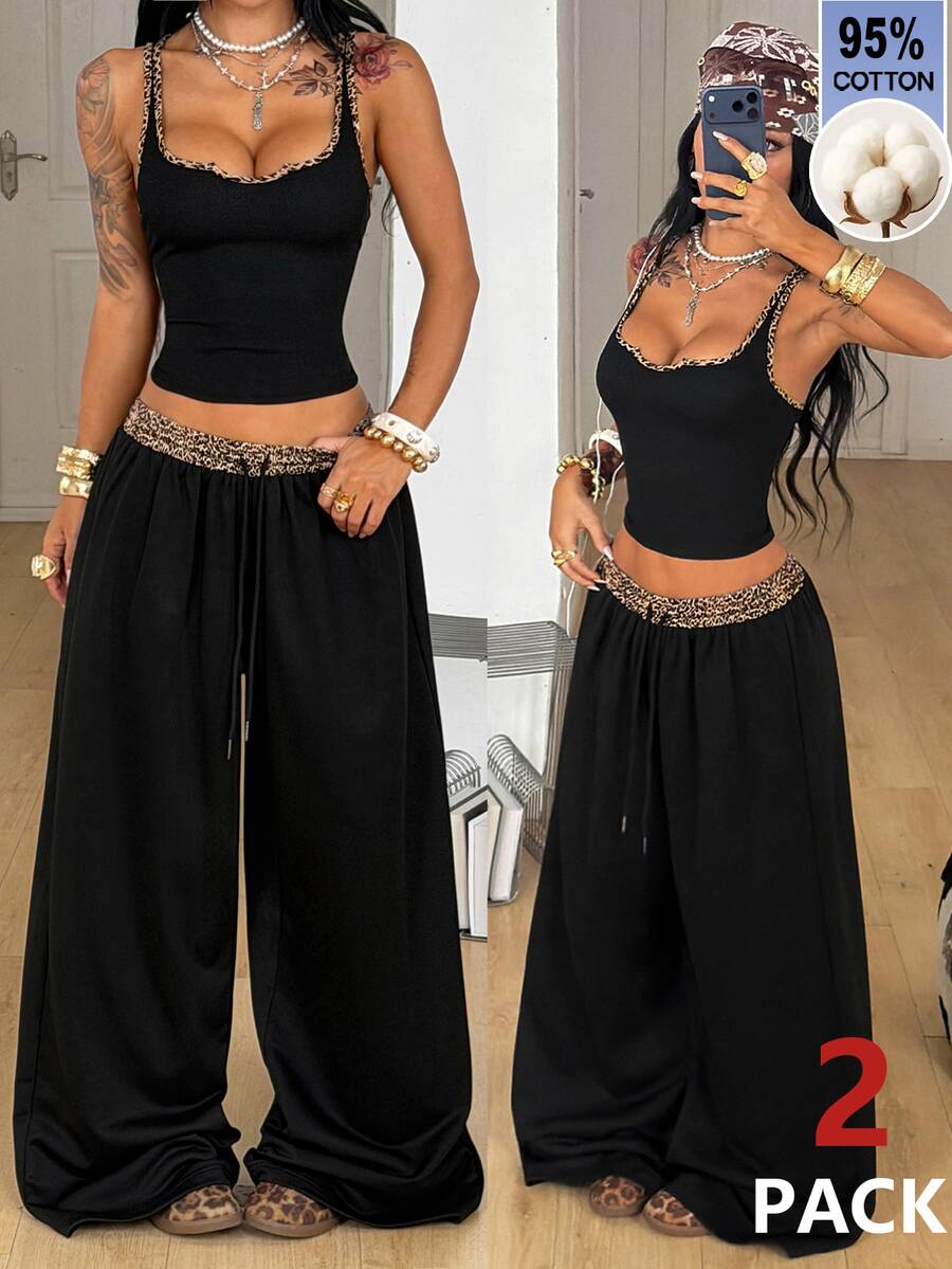 Women's two-piece casual outfit featuring a slim-fit camisole tank top with ruffle trim and button front paired with high-waisted wide leg pants.