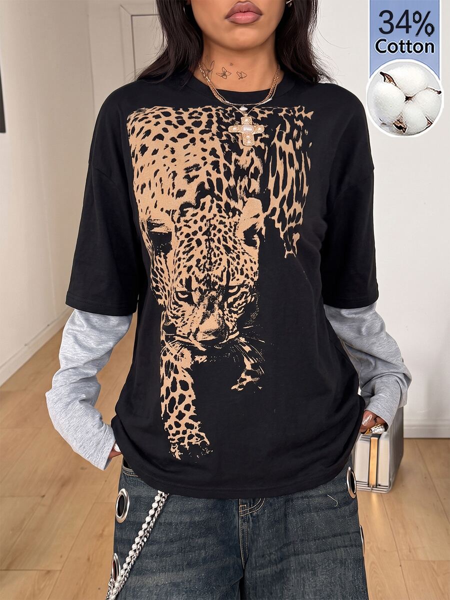 Women's casual graphic long sleeve t-shirt with a round neck, drop shoulder sleeves, and loose relaxed fit.