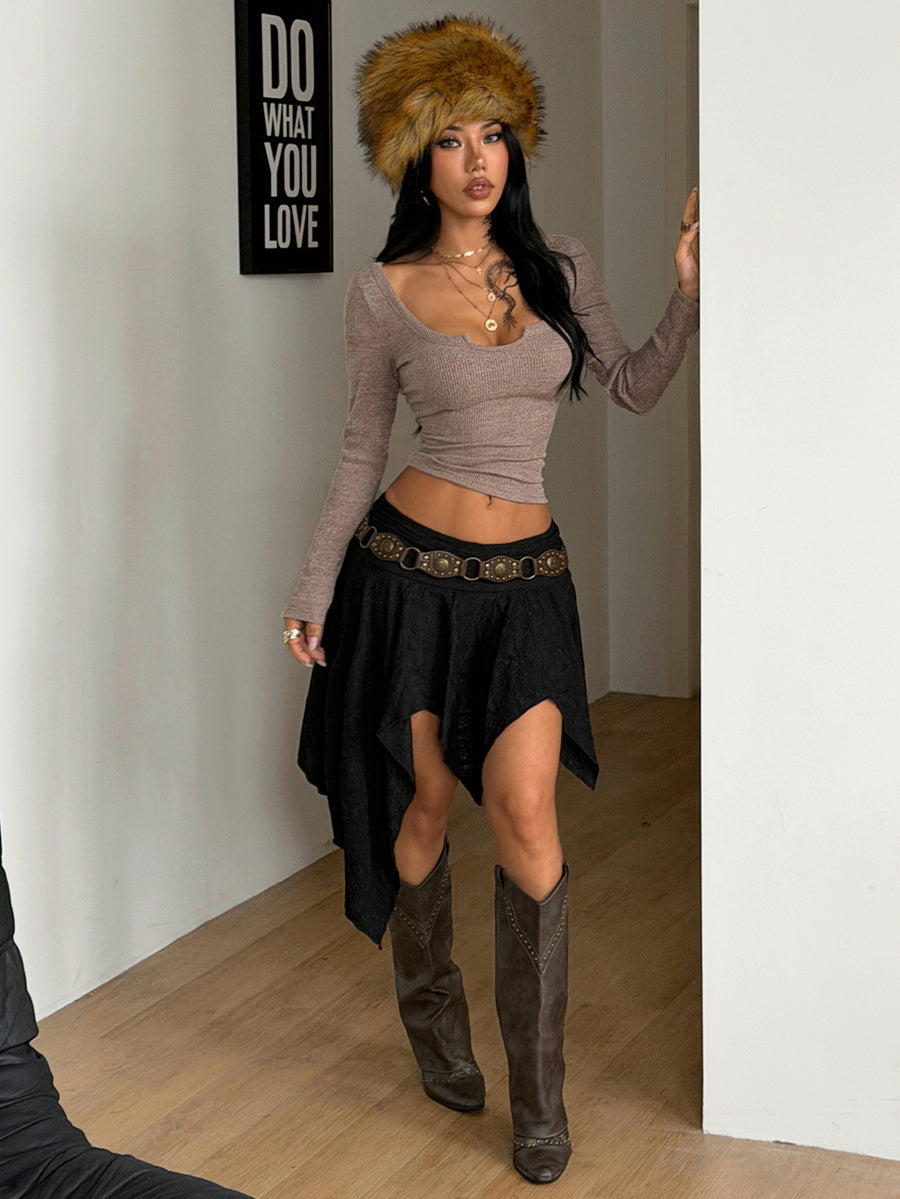 Women's floral lace mini skirt in white with asymmetrical ruffle trim and low waist design.