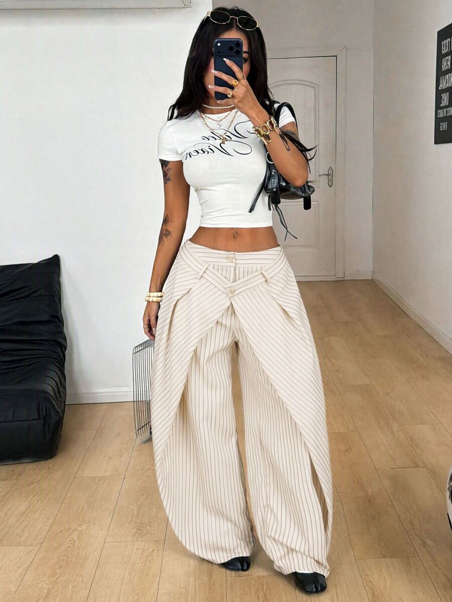 Women's loose fit pleated wide leg pants in royal blue pinstripe woven fabric with zipper fly closure.