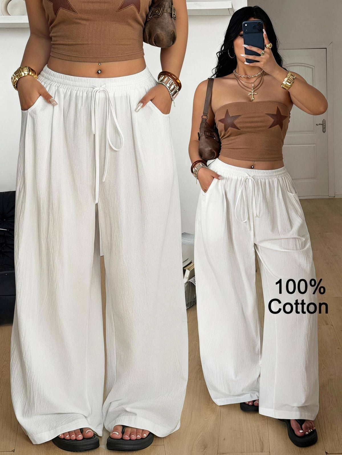 Plus size women's striped loose straight leg cropped pants with pleated detailing and side pockets