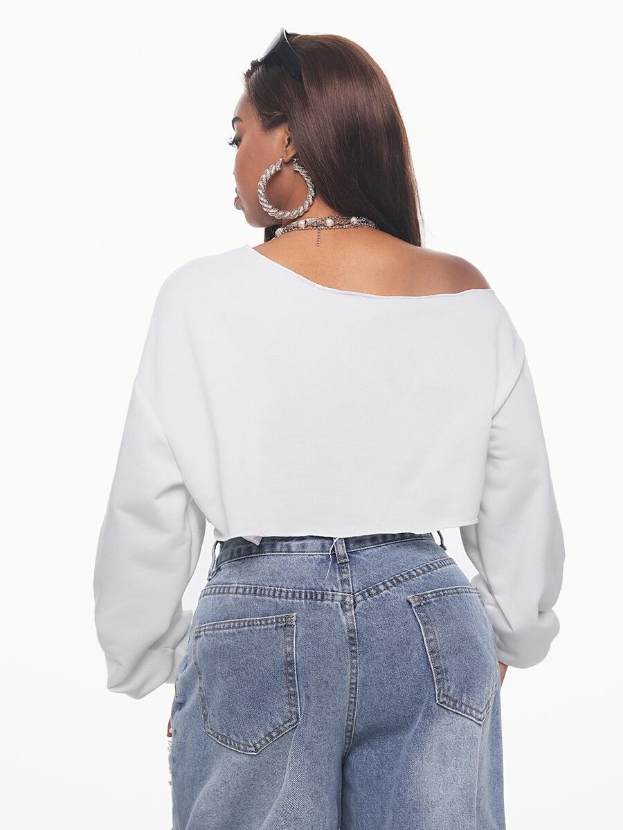 Women's plain oversized boat neck sweatshirt with long raglan sleeves in a relaxed pullover fit.