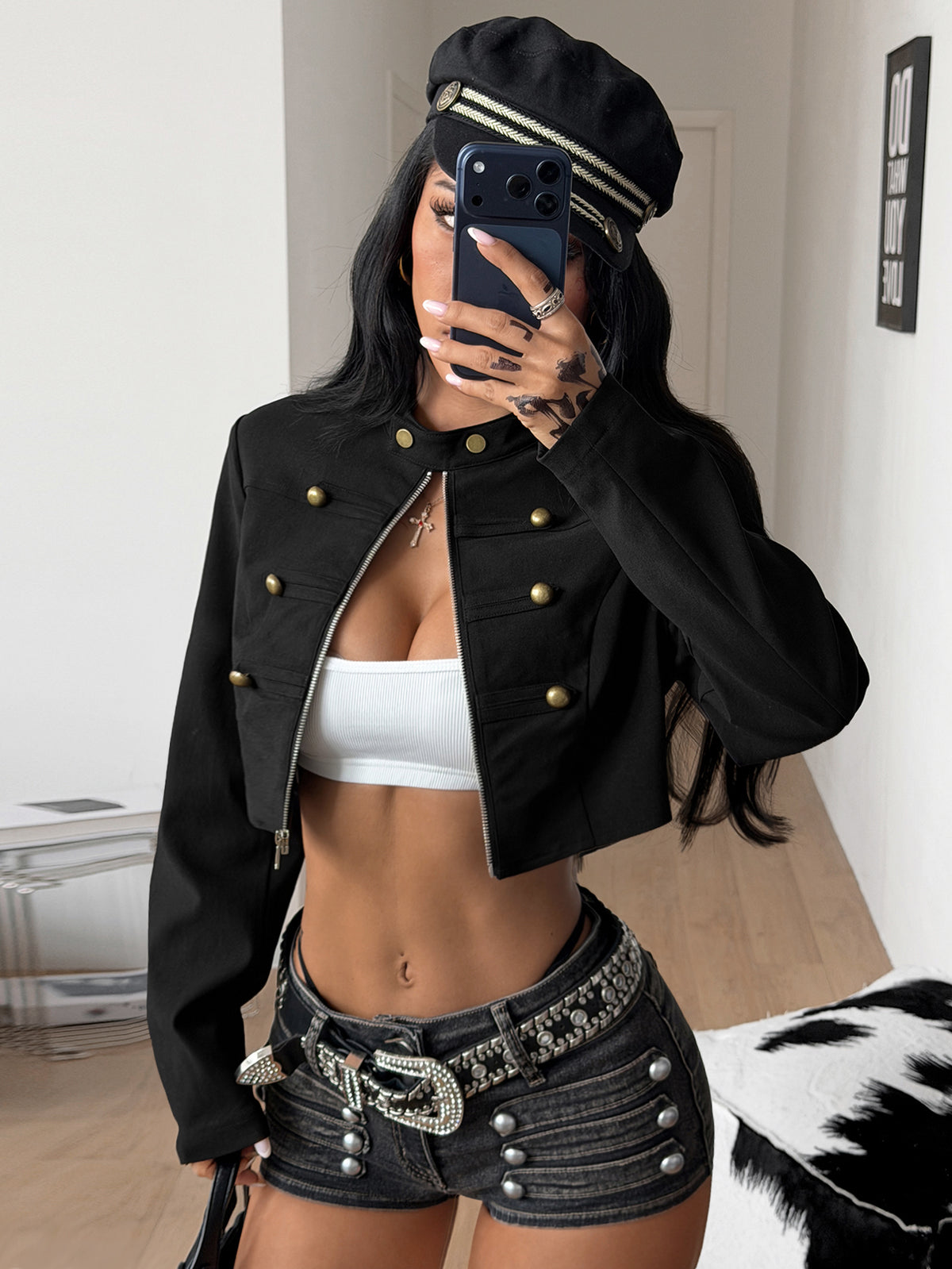 Women's metallic grey cropped faux leather jacket featuring a stand collar and asymmetrical zip front closure.